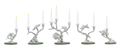 Forbes completes his first table centrepiece candelabra, a scene of Hawksbill Turtles swimming through stag horn coral trees that hold the candles. Their eyes are set with emeralds and the tableau is further lit by gemset Sea Urchin tea light holders.