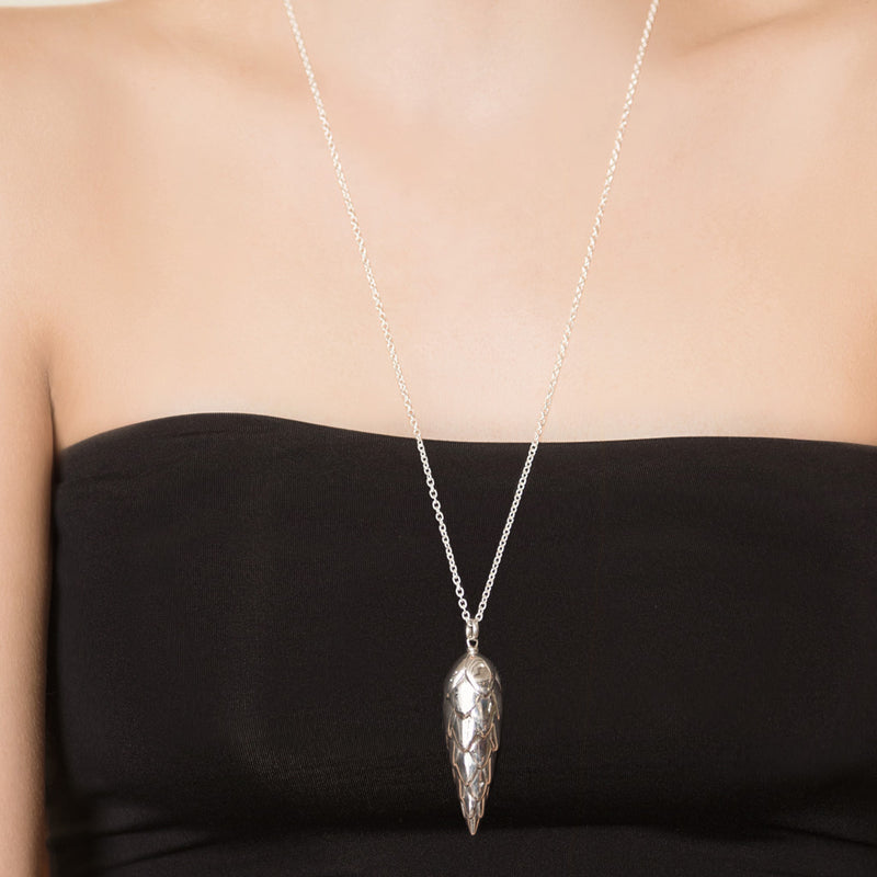Model Wearing Large Pangolin Scale Pendant in Sterling Silver